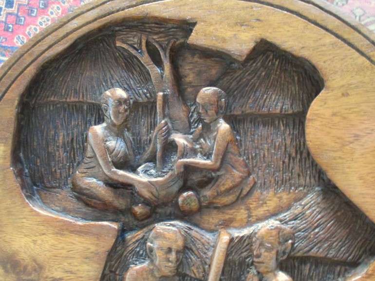 Awesome very heavy hand carved solid wood table from Kampala, Uganda (signed by artist Sekyanzi)