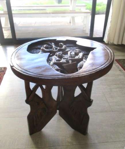 Awesome very heavy hand carved solid wood table from Kampala, Uganda (signed by artist Sekyanzi)