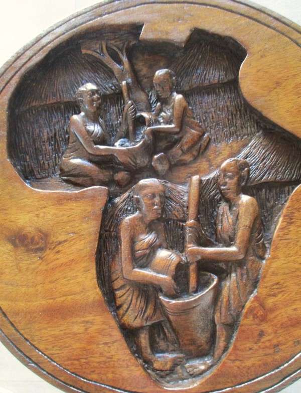 Awesome very heavy hand carved solid wood table from Kampala, Uganda (signed by artist Sekyanzi)