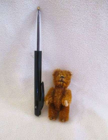 Tiniest miniature hand crafted mohair artist teddy bear with movable limbs and head - only 7cm tall