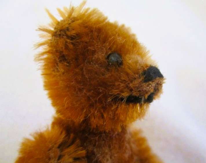 Tiniest miniature hand crafted mohair artist teddy bear with movable limbs and head - only 7cm tall