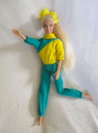 Relisted - An articulated Mattel Barbie doll with very long hair in cute Barbie? tracksuit