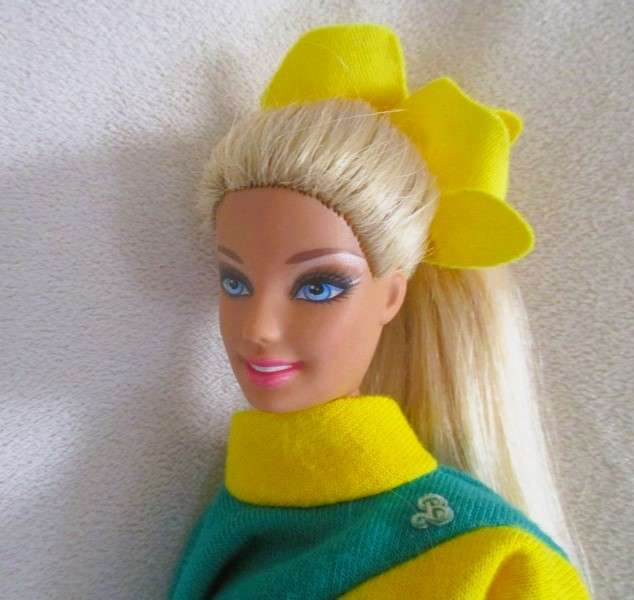 Relisted - An articulated Mattel Barbie doll with very long hair in cute Barbie? tracksuit