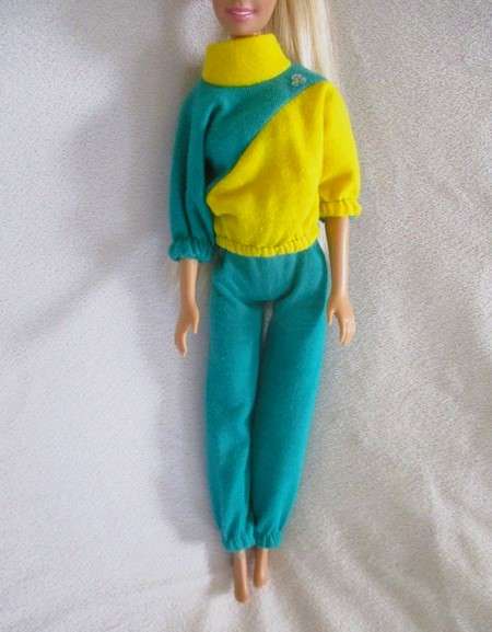Relisted - An articulated Mattel Barbie doll with very long hair in cute Barbie? tracksuit