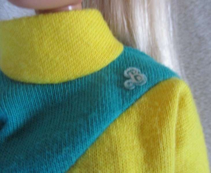 Relisted - An articulated Mattel Barbie doll with very long hair in cute Barbie? tracksuit