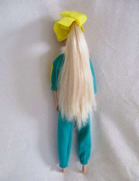 Relisted - An articulated Mattel Barbie doll with very long hair in cute Barbie? tracksuit