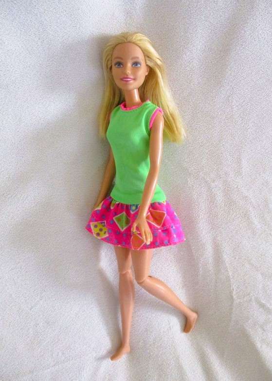 A pretty Mattel Barbie doll  with articulated knees