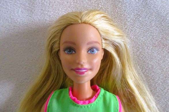 A pretty Mattel Barbie doll  with articulated knees