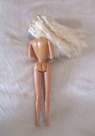 Vintage Mattel Barbie with long crimped hair - knees bend