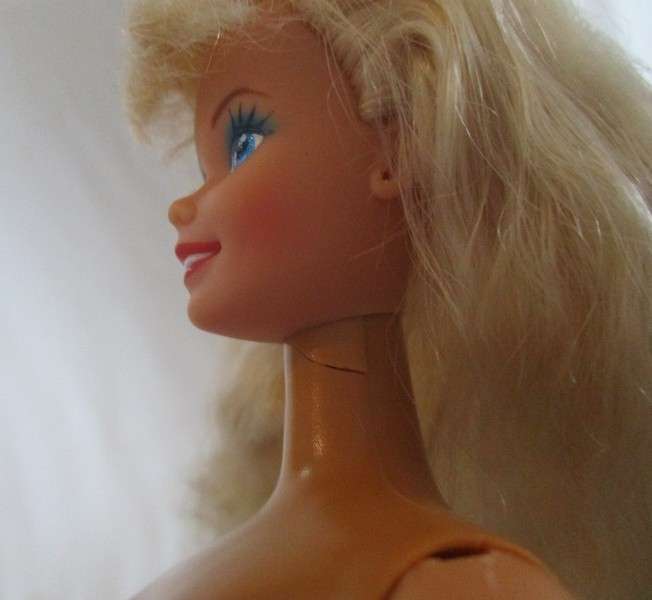 Vintage Mattel Barbie with long crimped hair - knees bend
