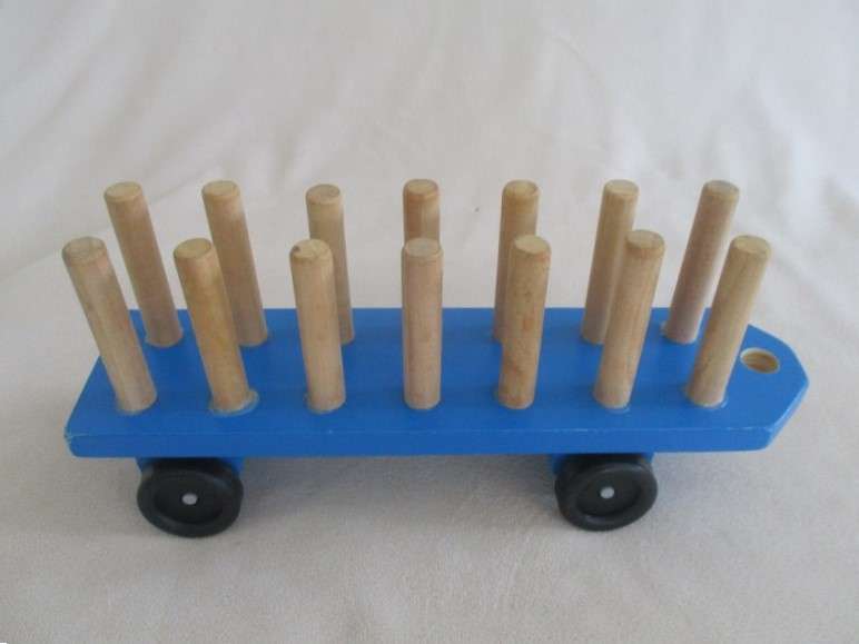 A classic Melissa and Doug wooden alphabet truck