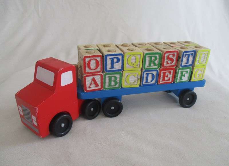 A classic Melissa and Doug wooden alphabet truck