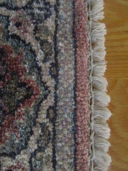 A vintage hand made Persian table mat