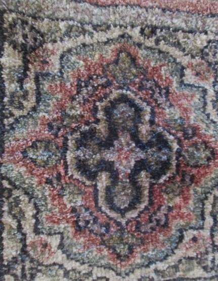 A vintage hand made Persian table mat