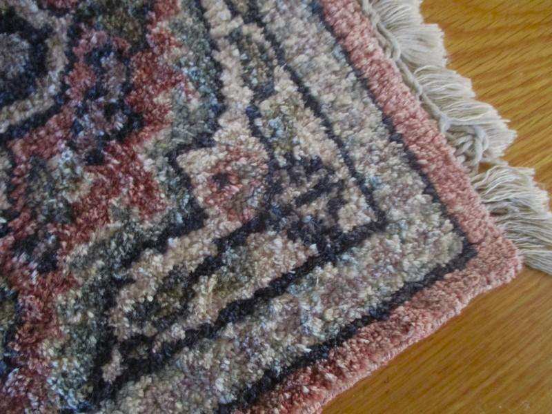 A vintage hand made Persian table mat