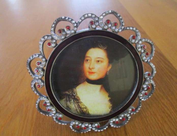 Two very decorative standing picture/photo frames