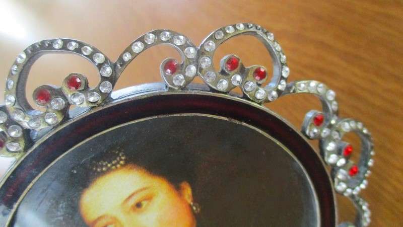 Two very decorative standing picture/photo frames