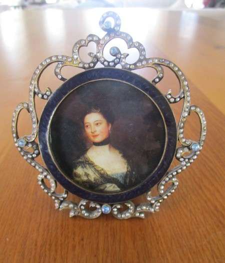 Two very decorative standing picture/photo frames