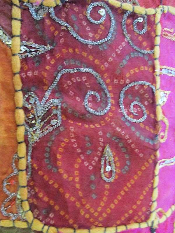 Two vintage ornate hand embroidered Indian/Thai wall hangings/cloths/couch backers