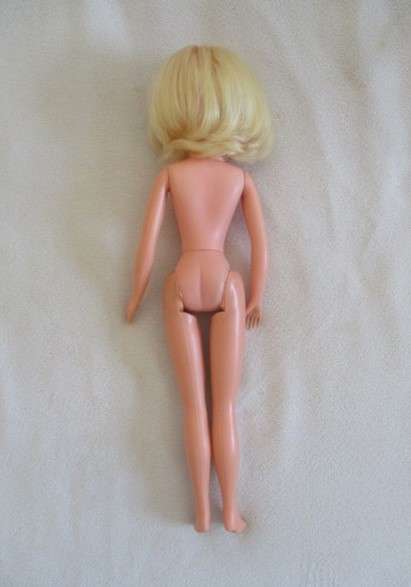 A vintage and unusual 1960's Sindy doll with numbers under hair