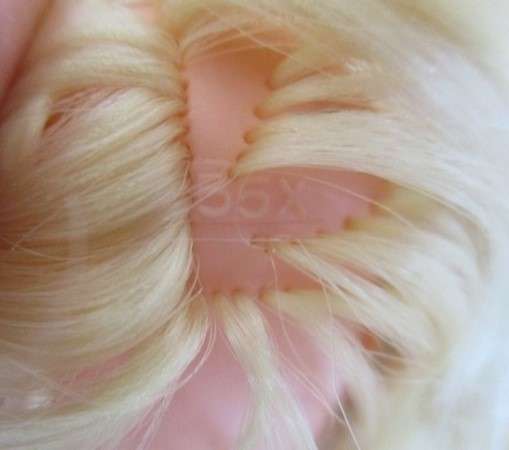 A vintage and unusual 1960's Sindy doll with numbers under hair