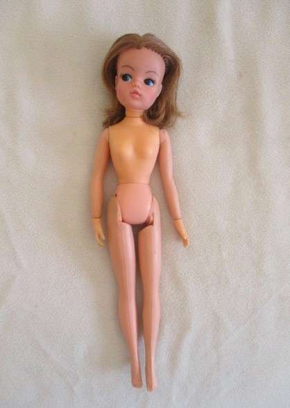 A vintage red headed Sindy doll