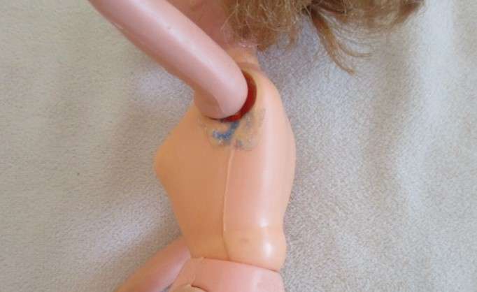 A vintage red headed Sindy doll