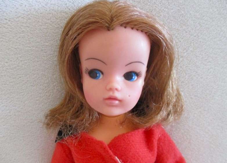 A vintage red headed Sindy doll