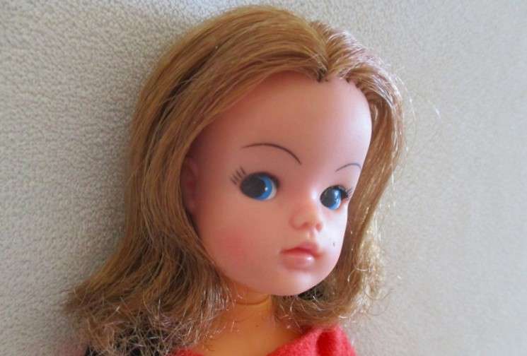 A vintage red headed Sindy doll
