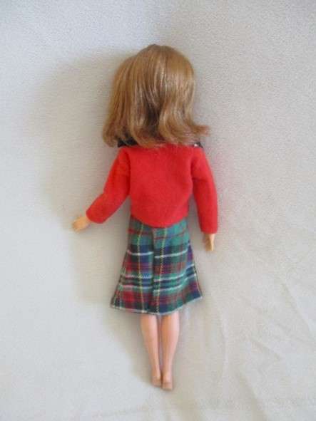 A vintage red headed Sindy doll