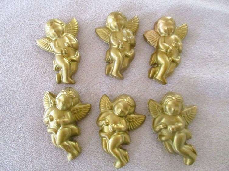 Six adorable and different Cherub fridge magnets