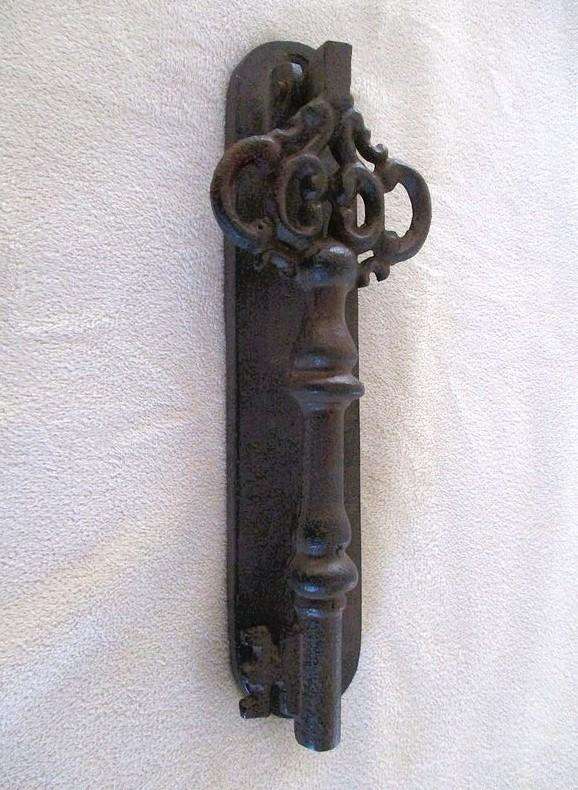 Vintage/antique heavy duty cast iron key-shaped door knocker