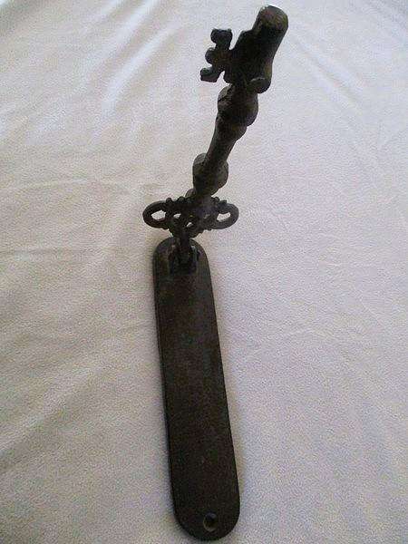 Vintage/antique heavy duty cast iron key-shaped door knocker