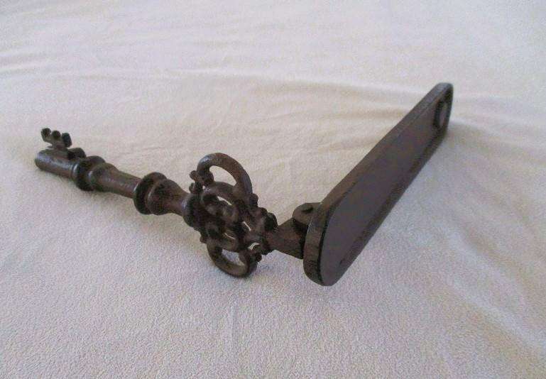 Vintage/antique heavy duty cast iron key-shaped door knocker