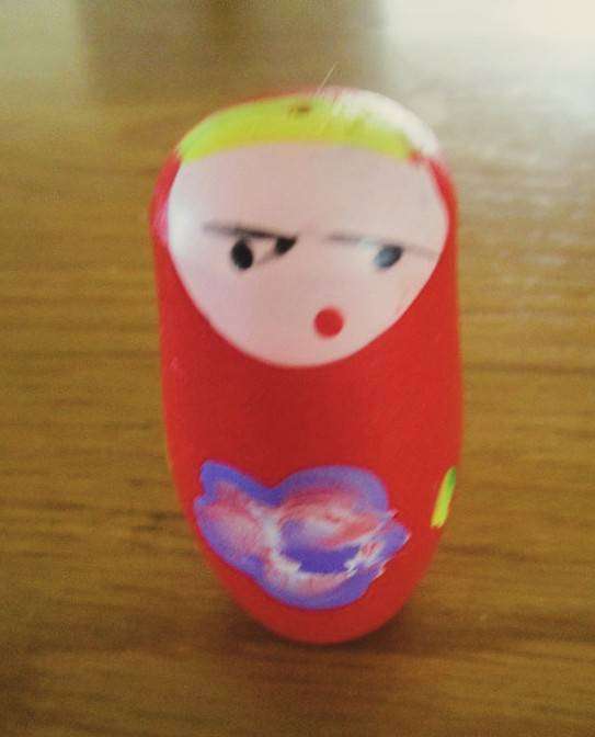 Five piece set of  wooden hand painted Matryoshka nesting dolls