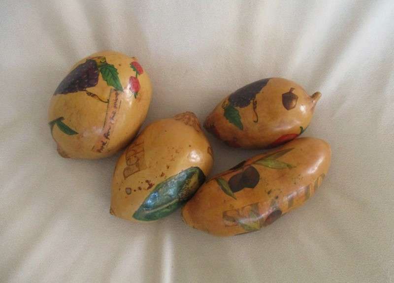 Four real hand painted and very decorative Calabashes