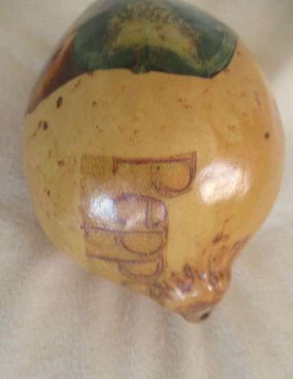 Four real hand painted and very decorative Calabashes