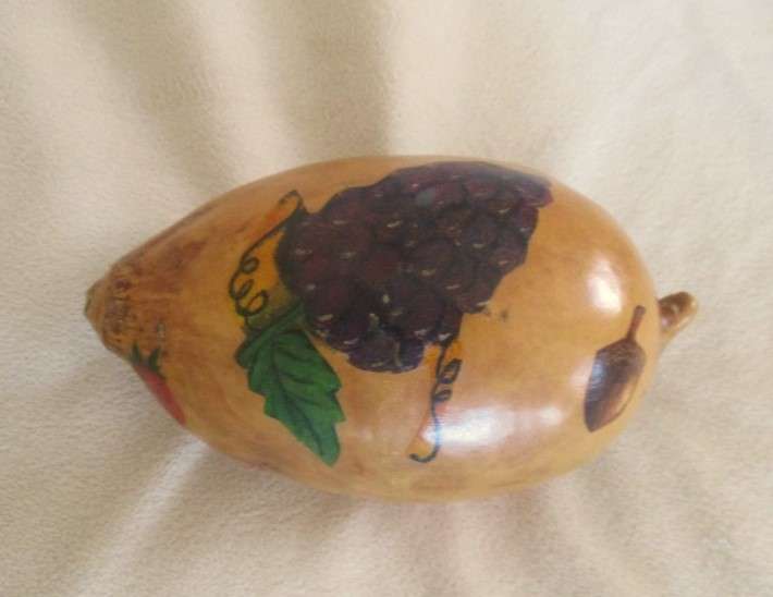 Four real hand painted and very decorative Calabashes