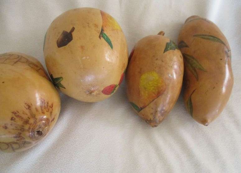 Four real hand painted and very decorative Calabashes