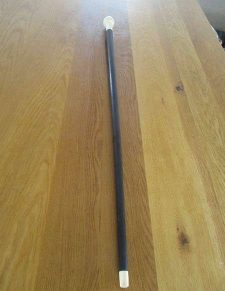 Vintage ebony walking stick with bone handle and tip