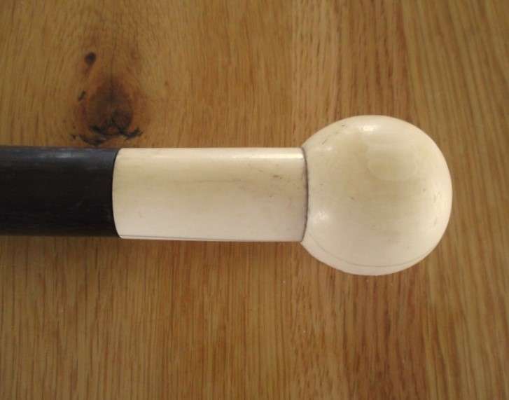 Vintage ebony walking stick with bone handle and tip
