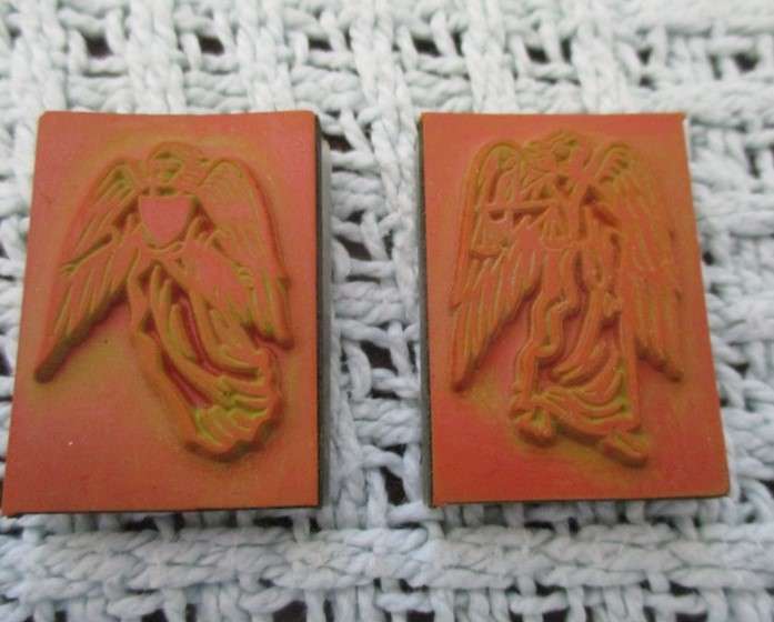 A box of twelve Angel blessing rubber stamps  with Archangel Michael base/applicator