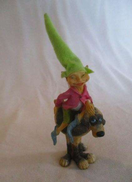 Cute cheeky-faced pixie on his hound