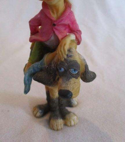 Cute cheeky-faced pixie on his hound