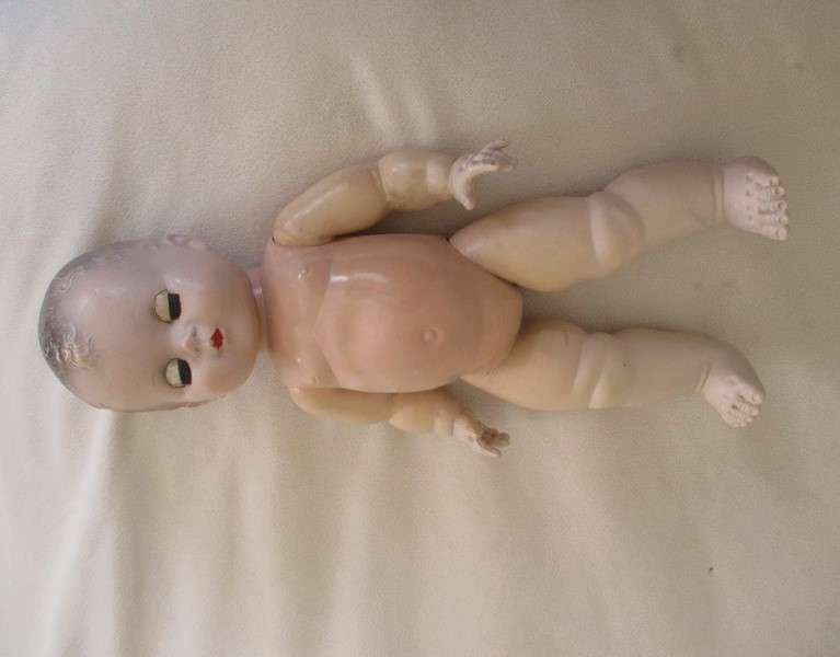 Vintage 1950's hard plastic doll with open/close eyes - 31cm tall