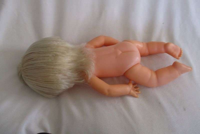 Pretty vintage First Love Baby Love drink and wet doll in pretty outfit