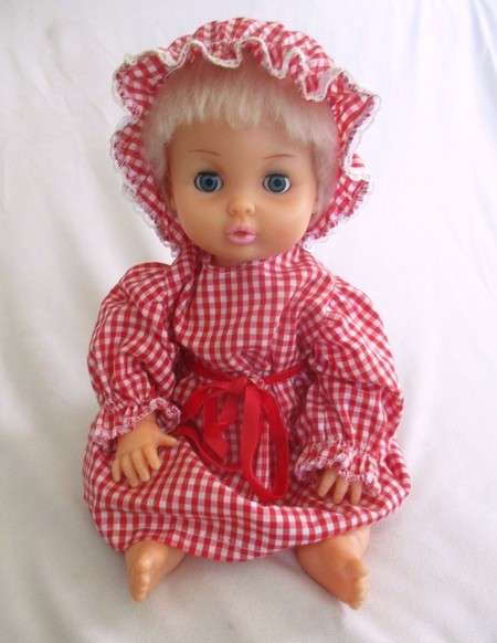 Pretty vintage First Love Baby Love drink and wet doll in pretty outfit
