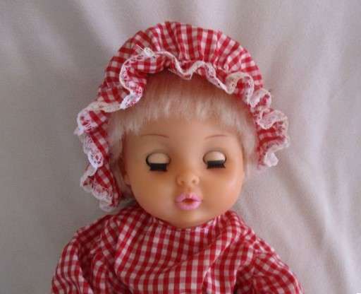 Pretty vintage First Love Baby Love drink and wet doll in pretty outfit