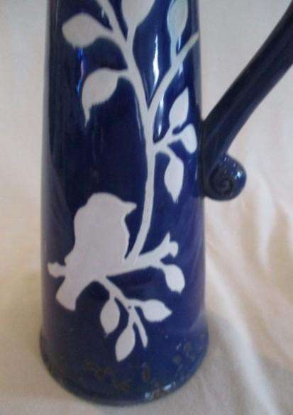 Large, unique purposefully antique-looking ceramic jug vase made to resemble aged enamel