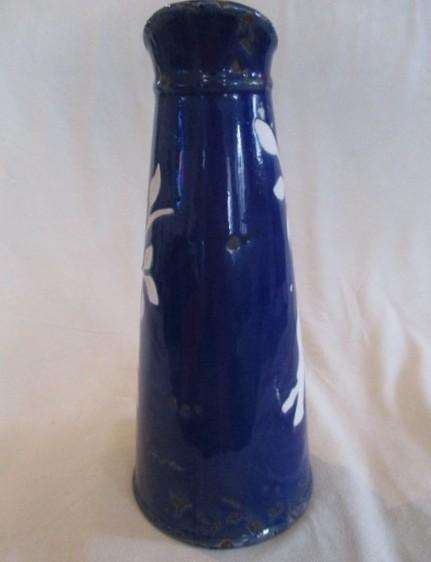Large, unique purposefully antique-looking ceramic jug vase made to resemble aged enamel